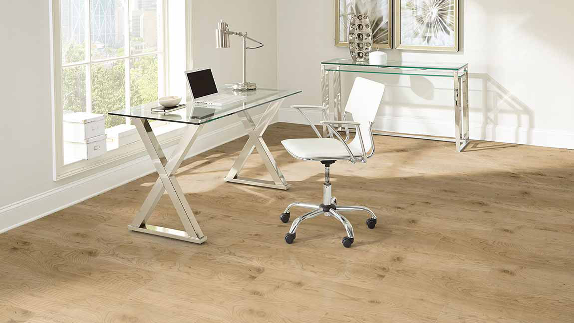 Luxury vinyl flooring in a home office, installation services available.
