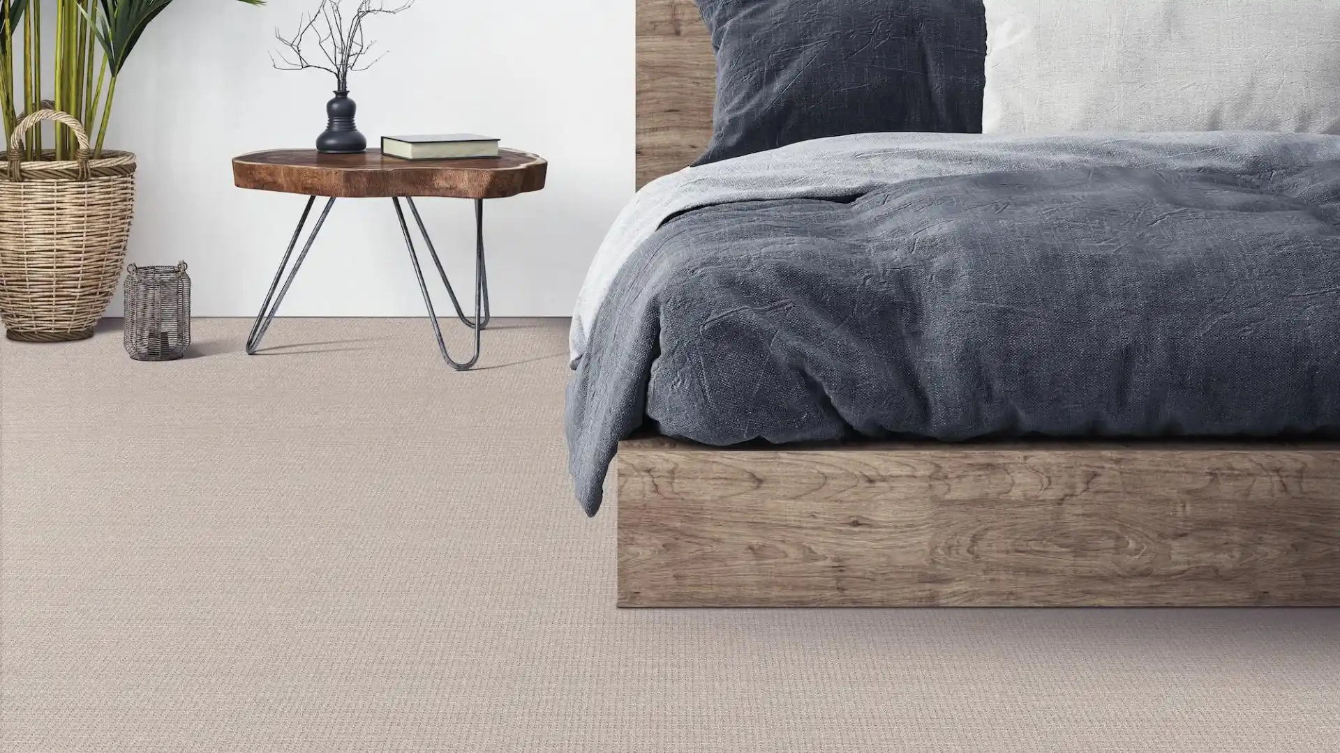 carpet floor in resort-themed bedroom with palm plants. 